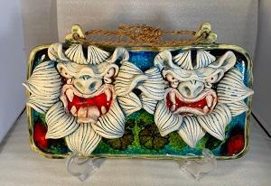 写真：白寿面シーサー・琉球面シーサー